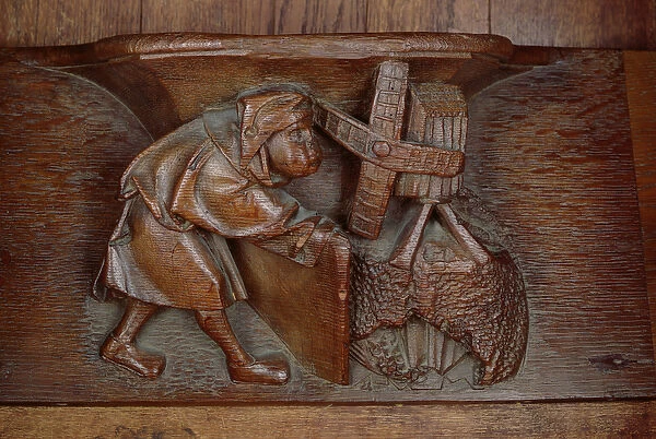 Carving of a miller, from a choir stall (wood)