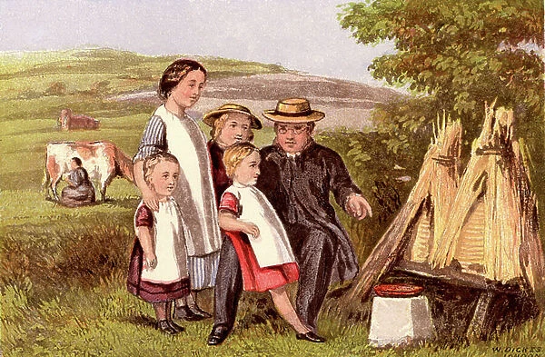 Children being shown straw beehives or skeps