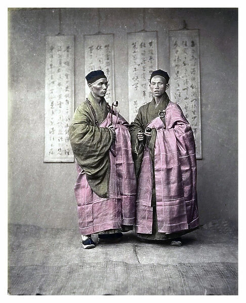 Chinese men in matching traditional dress