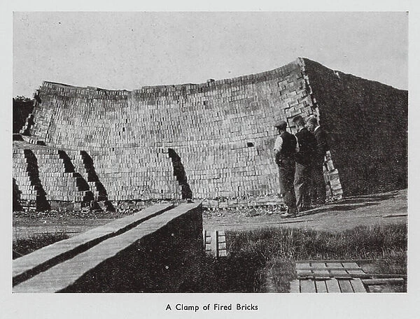 Clamp of fired bricks in a Sussex brickyard (b / w photo)