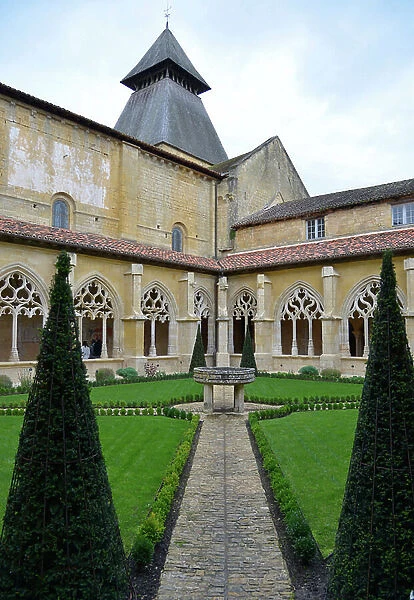 The cloitre around the garden of the Abbey Notre Dame de la Nativite (consecrated in 1154) of Cadouin (Dordogne, Perigord)
