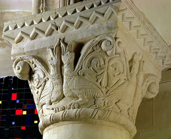 Column capital bearing symmetrically arranged grotesques, from the hemicycle choir