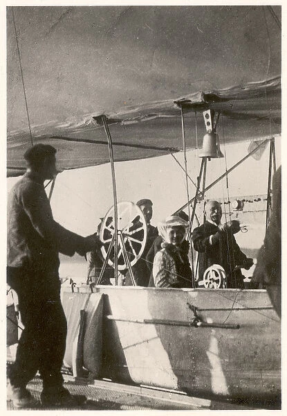 Count Ferdinand von Zeppelin with his daughter and engineer Ludwig Duerr in the gondola