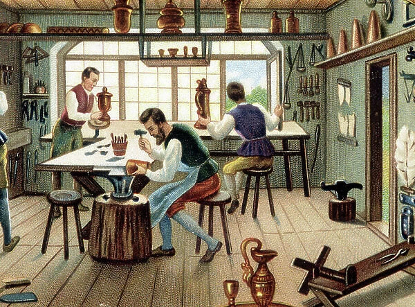 Craftsmen in a copper pottery workshop