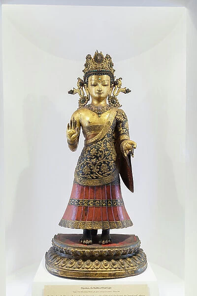 Dipankara, the Buddha of fixed light, Nepal (bronze, gilt, paint and semiprecious stones)