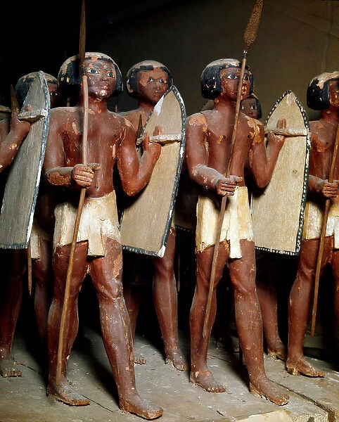 Egyptian antiquite: sculpted wooden group of Nubian archers representing the army of