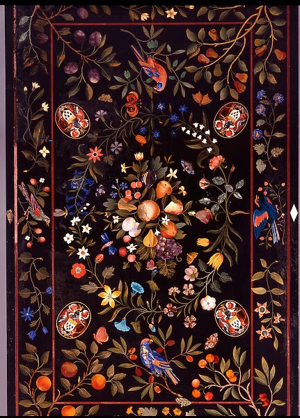 A Florentine pietra dura table top inlaid with various marble
