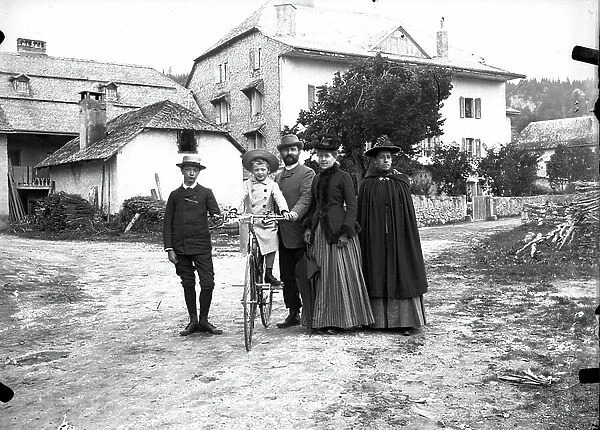 France, Basque Country: A family poses with an old bike 1890