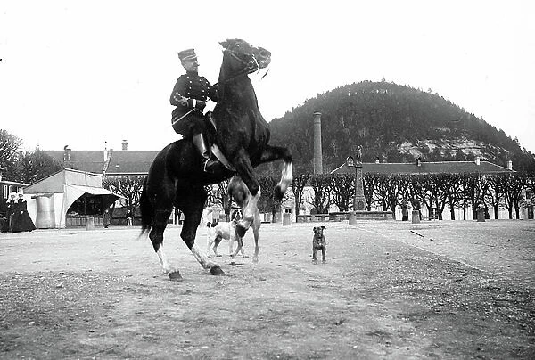 France, Lorraine, Vosges (88), Saint-Die: An officer parading with his horse on a walking square. Monument, fountain, dog and good sisters, 1895 - regiment n 10