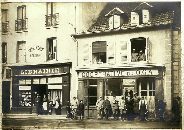 France: In a town the cooperative of QGA P Bardoz next to a bookstore, 1914