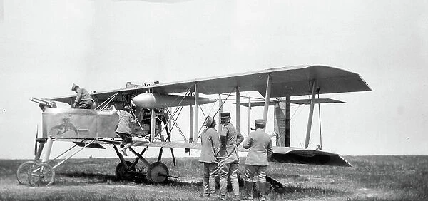 France: War 1914-1918, aircraft with propellant engine, LA10 biplane, reservoirs and machine gun. Animated view with soldiers, 1914