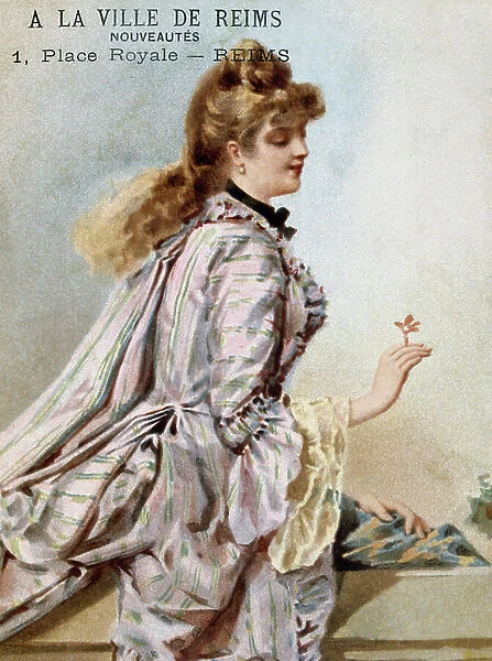 French postcard with image of a woman holding a flower, 1900