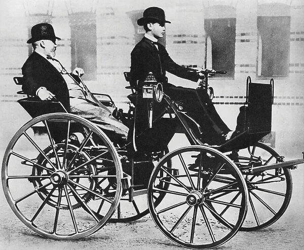 Gottlieb Daimler, with his son driving, in the first motor car, 1886 (b  /  w photo)