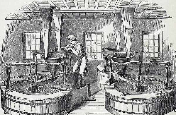 The grinding of grain in a distillery