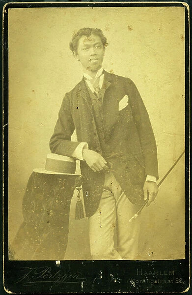Haarlem: Portrait of an indigenous from the Dutch (Indonesian) colonies in studio, 1875