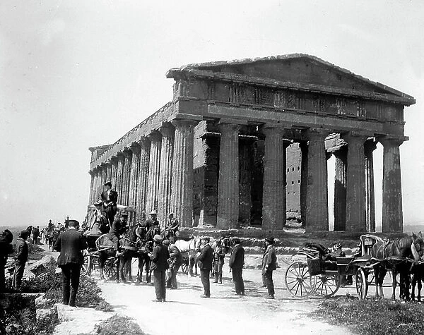Italy, Sicily, Palermo: tourists by car hippomobile visit a Roman temple, 1890