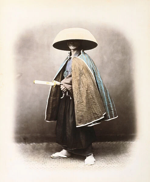 A Japanese Samurai in Traditional Costume, c. 1868 (hand tinted albumen print)