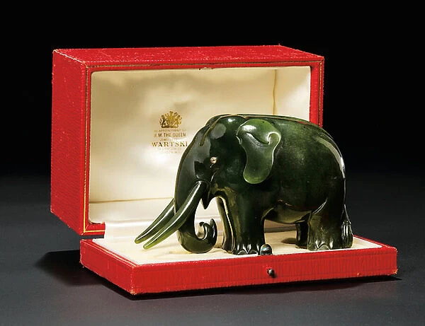A jewelled nephrite model of an elephant, with diamond-set eyes, c