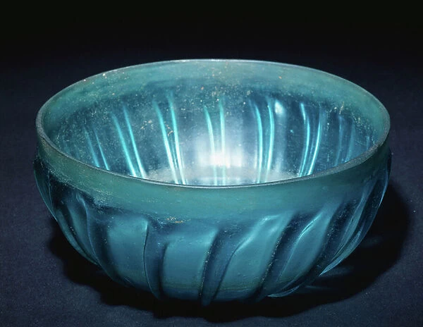 A large translucent green glass pillar-moulded bowl, 1st century AD (glass)