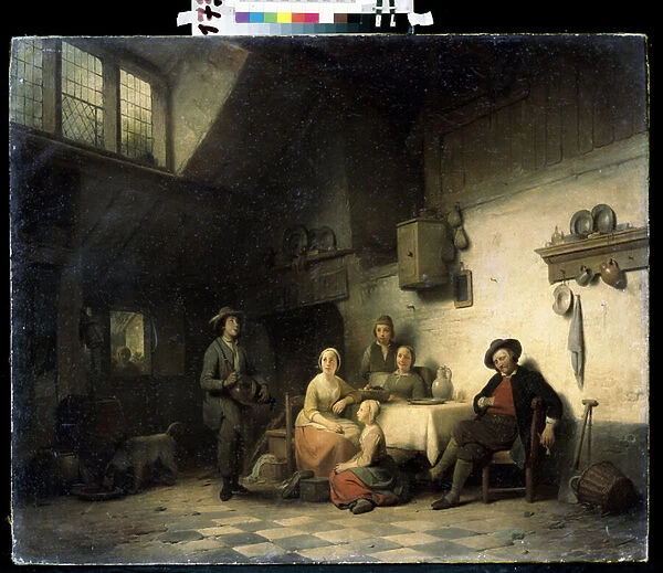 'Le concert prive'(House concert) Une famille reunie dans un interieur modeste en Belgique ecoute un musicien jouant de la vielle a roue