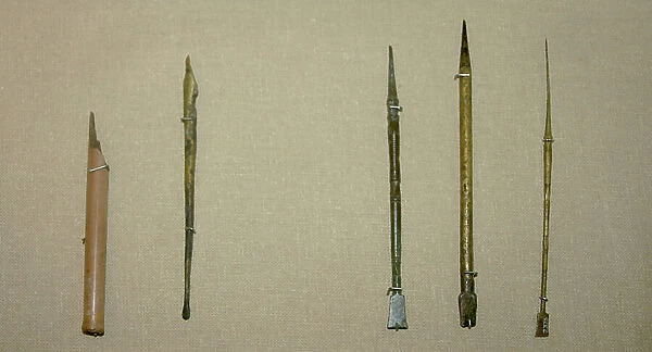 Left: Reed pen with a split nib from the Roman Era in Egypt circa 1st Century AD. On the right Styli (three stylus pens) used in the Roman Empire c2nd Century AD. (object)