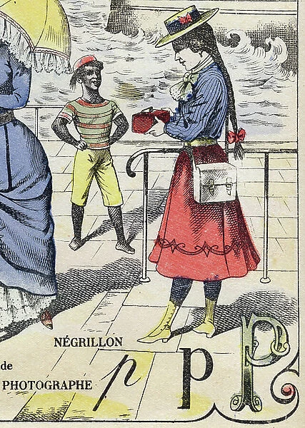 Letter P as photographer. Negrillon. Doll's alphabet. Imaging of Pont-a-Mousson by Louis Vagne, c.1900 (lithograph)