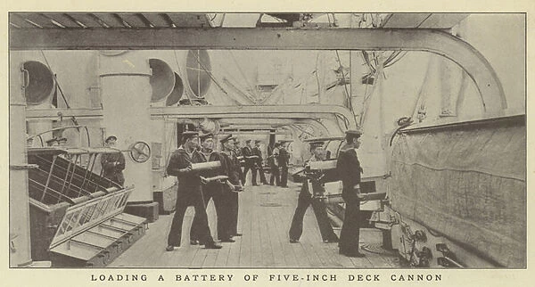 Loading a battery of five-inch deck cannon (b  /  w photo)