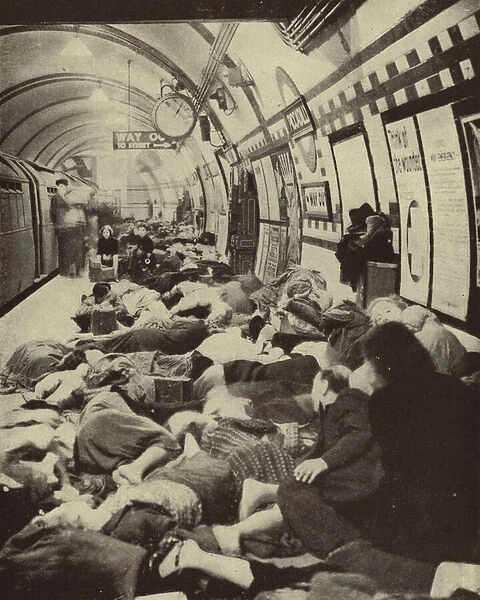 Londoners sheltering from a German air raid on a platform in Piccadilly Underground Station during the Blitz, World War II, September 1940 (b  /  w photo)