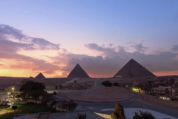 The three main pyramids at dusk, Giza, Egypt, 2020 (photo)