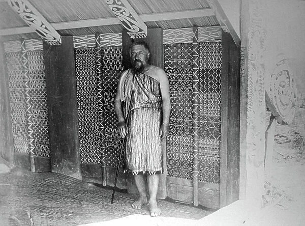 Maori traditional hut with tribal priest, 1899