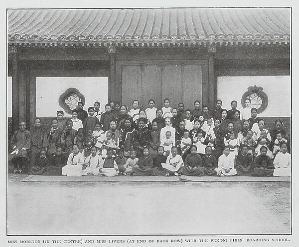 Miss Moreton (in the centre) and Miss Livens (at end of back row) with the Peking Girls Boarding School (b / w photo)