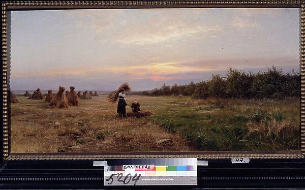 Moisson dans la lumiere du soir. (Harvest in the Evening Light). Deux femmes travaillant dans un champs plein de meules de foins. Peinture de Iosiph Evstafievich Krachkovsky (1854-1914), huile sur toile, 1884. Art russe, paysage 19e siecle