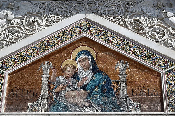 Mosaic of Virgin Mary and Child on the facade of Saint Spyridon Orthodox Church. Trieste. Italy