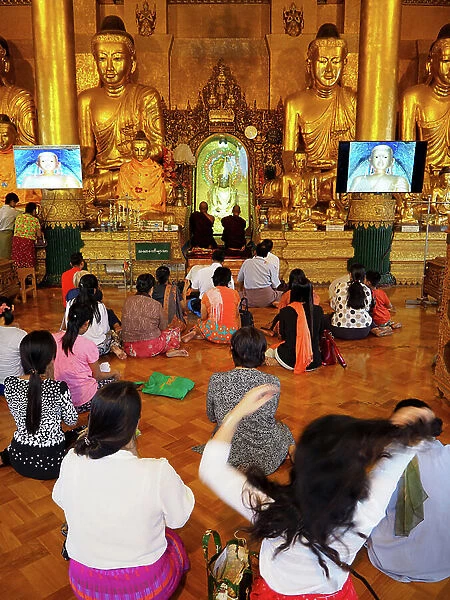 Myanmar - Burma: Yangon. Shwedagon Pagoda. Opened in 1372. Height 105 m. People in prayer and meditation