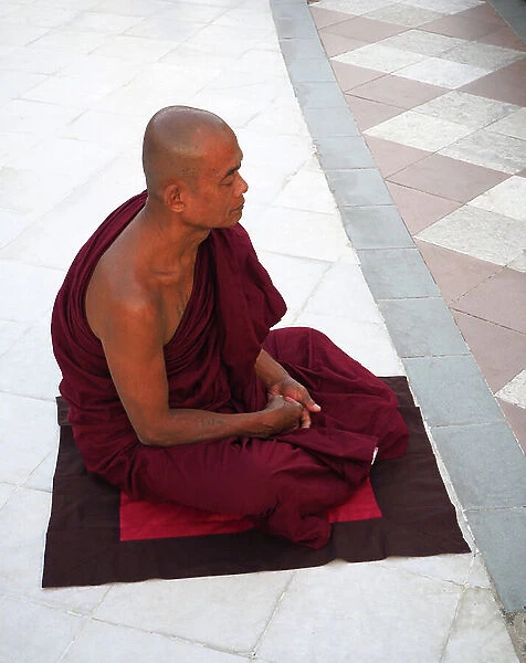 Myanmar - Burma: Yangon. Shwedagon Pagoda. Opened in 1372. Height 105 m. Monk monk praying and meditating