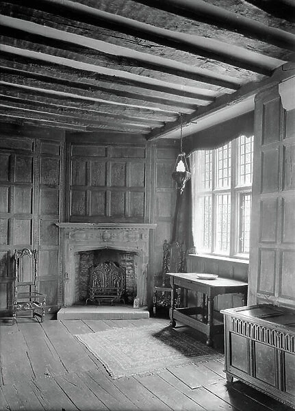 An oak-panelled bedroom, Little Sodbury Manor, Gloucestershire, view from the front porch, from Country Houses of the Cotswolds (b / w photo)