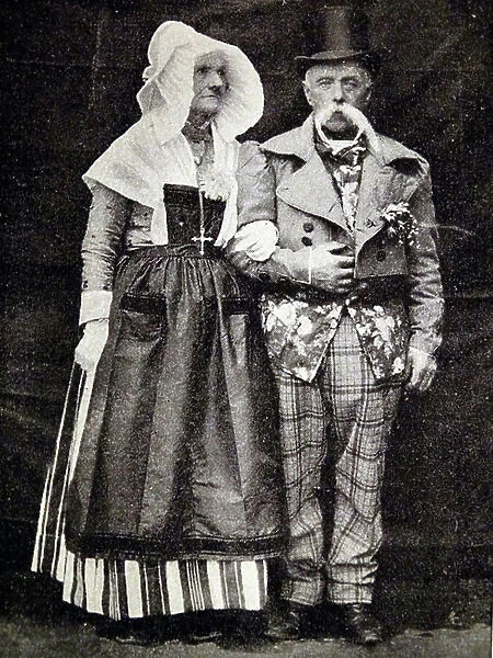 Photographic print of a husband and wife in traditional Norman costume