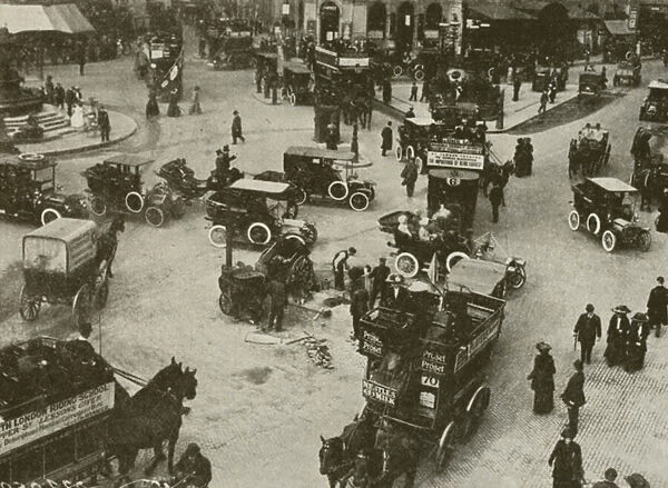 Piccadilly Circus, London, in 1910, showing the mixture of horse-drawn and motor vehicles (b  /  w photo)