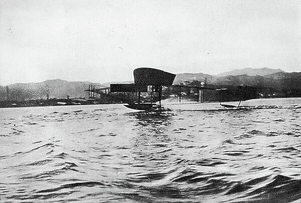 Pioneers of Italian aviation: The seaplane of Mario Calderara at the time of detachment from the water in the port of La Spezia 1911. Italy