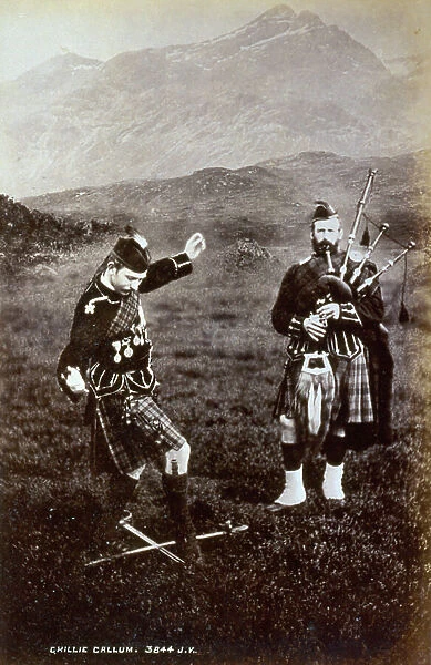 Portrait of two Scotchmen in traditional attire. One of them is doing the sword dance accompanied by bagpipes, 1860 (print on double-weight paper)