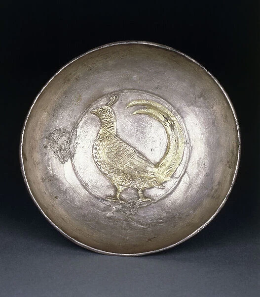 A post-Sasanian silver dish containing a repousse gold pheasant, c. 8th century AD (silver, gold)