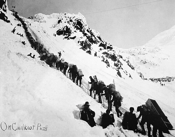 Prospectors climbing the Chilkoot Pass during the Klondike Gold Rush (1897-98) (b  /  w photo