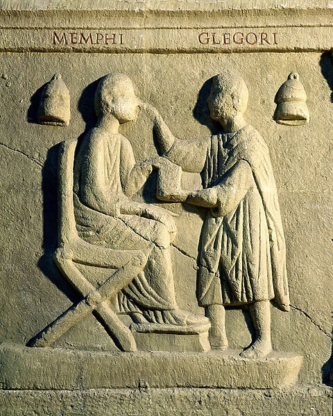 Relief depicting an oculist examining a patient (stone)