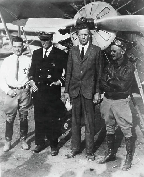 Right to left: Lt. James Doolittle, US Army Ace, Col. Charles Lindbergh, Lt. Al Williams, Navy Ace, and Clif Henderson, Director of the 1929 National Air Races. Sept 2, 1929 (b / w photo)