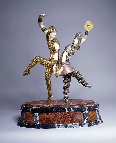 Russian Dancers, (silvered, gilt and gold painted bronze and ivory statuette, mott)