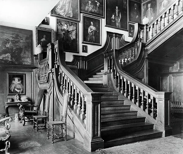 The staircase, Rushbrooke Hall, Suffolk, from England's Lost Houses by Giles Worsley (1961-2006) published 2002 (b / w photo)