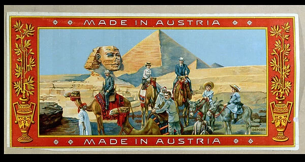Tourists at the pyramids in Egypt, label from a fez box, c. 1914 (colour litho)