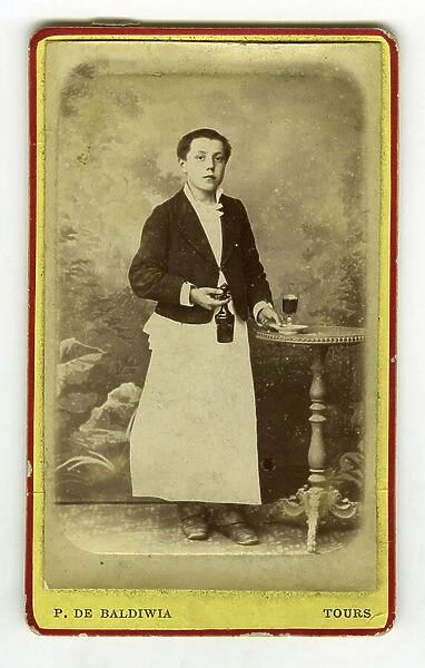 Tours, Indre-et-Loire (37), Centre, France, A coffee boy poses in studio in professional clothing, 1885