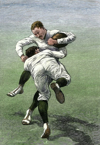 Training of American football players from Yale University, circa 1880. Low Tackle gesture. Illustration 19th century. Engraving on wood colour