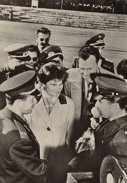 Valentina Tereshkova-Nikolayeva and Yuri Gagarin were heartily welcomed when they visited the frontier guards in Berlin on 20 October 1963 (b  /  w photo)